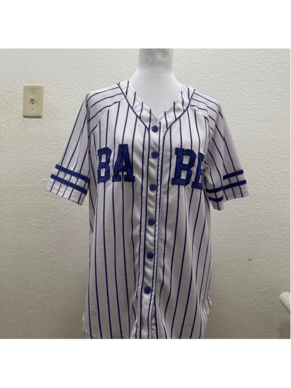 Stella McCartney white baseball jersey with blue vertical stripes and blue lette